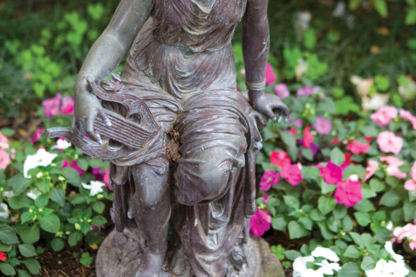 Garden statue in Holly Hall - A Christian Retirement Community