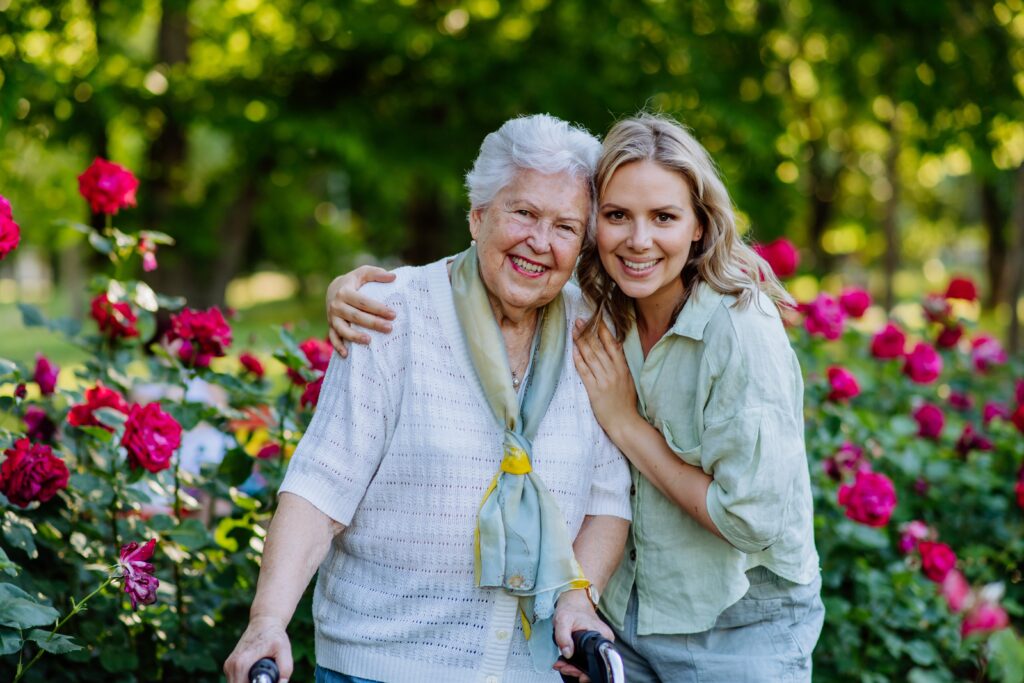 How Holly Hall Provides Peace of Mind for Families of Seniors 1 Happy senior woman with visiting adult daughter in a warm, welcoming Christian senior community in Houston